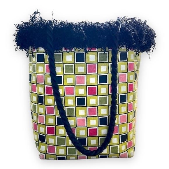 SMALL, REVERSIBLE, CANVAS PURSE. MEASURES AT BASE, 7”W X 4”D X 10”H. NO BRAND. - Picture 6 of 7